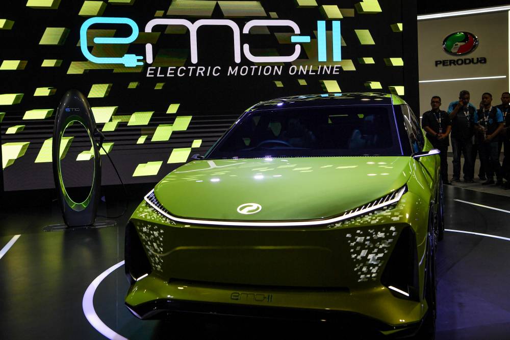 Perodua unveiled its eMO-II today, marking the next evolution of its prototype battery electric vehicle at the Kuala Lumpur International Mobility Show 2024 (KLIMS 2024). - Photo by Bernama