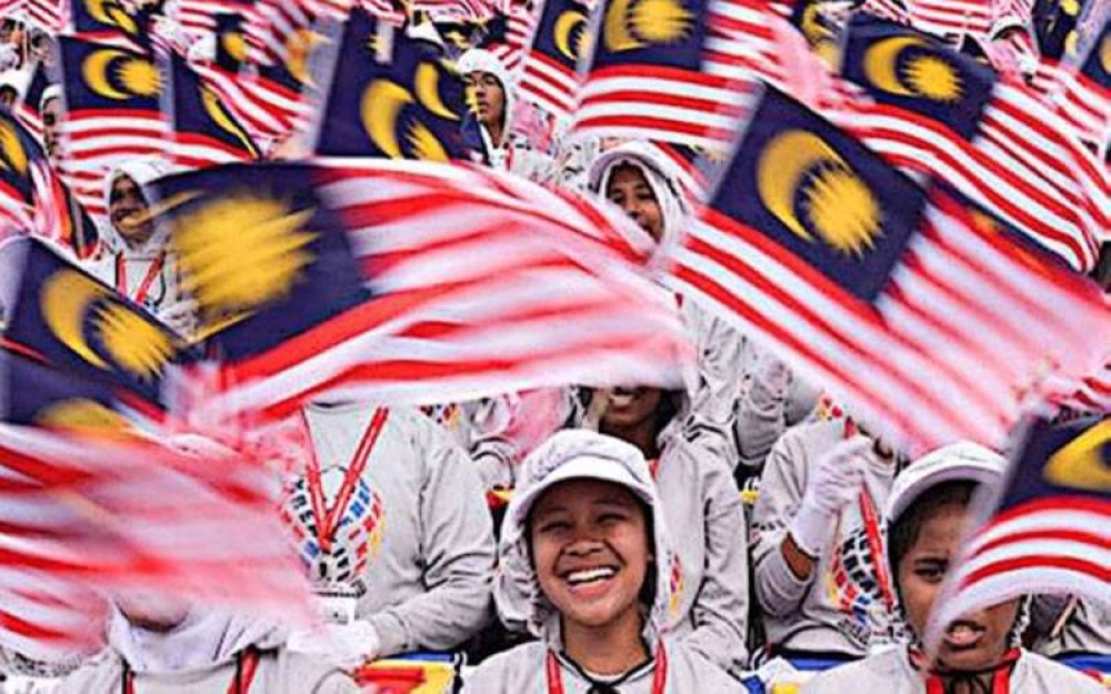 Riak wajah gembira tatkala menyertai perbarisan Hari Kebangsaan 2019 yang juga menjadi sambutan terakhir sebelum Covid-19 menular di Malaysia.