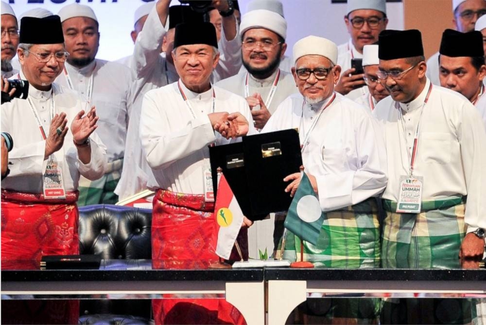 Detik bersejarah termeterainya gabungan MN oleh Pas dan UMNO pada September 2019.