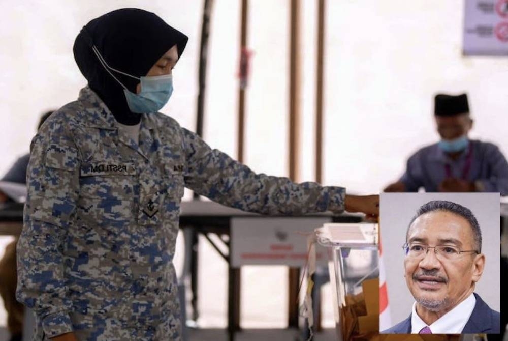 Kemenangan besar BN dalam PRN Johor sebahagiannya disumbangkan oleh undi tentera yang memihak dalam skala yang cukup besar kepada BN. GAMBAR KECIL: HISHAMMUDDIN