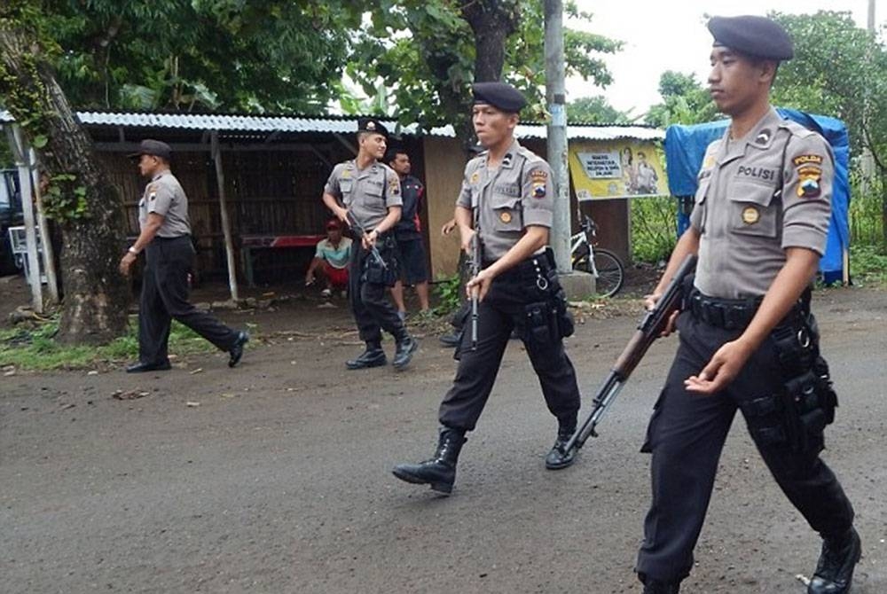 Imej polis Indonesia tercalar dengan berlakunya skandal besar dalam pasukan itu. - Foto AFP