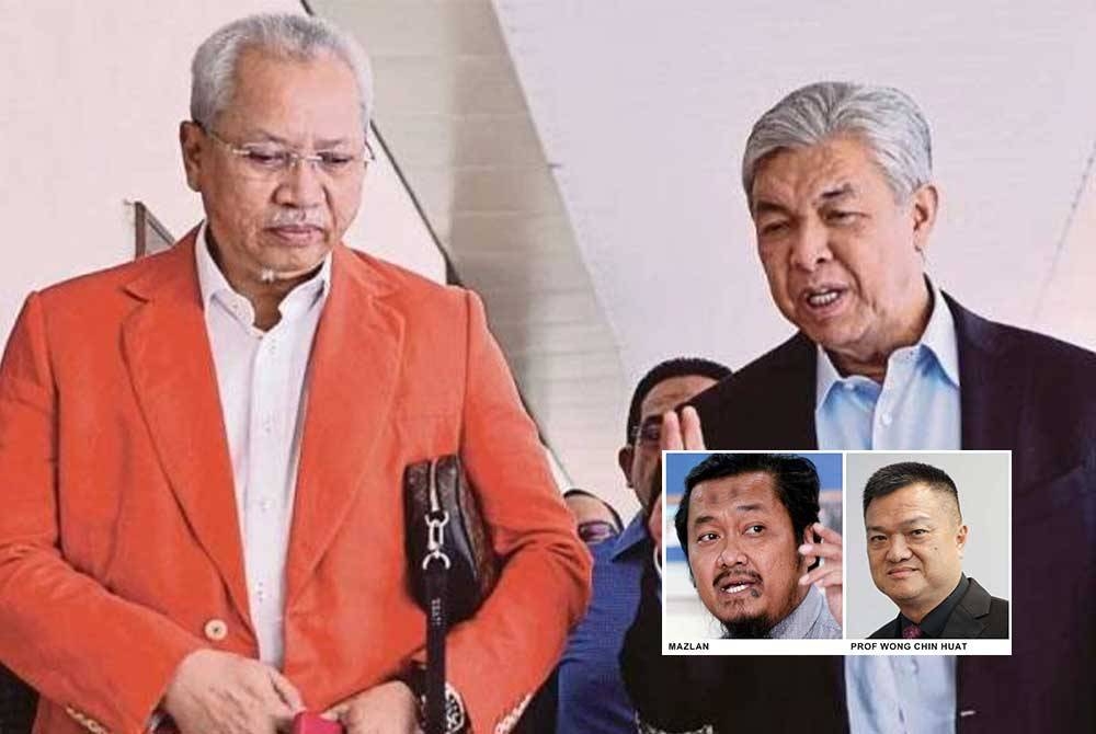 Annuar (kiri) dipecat daripada UMNO kerana didakwa melanggar disiplin parti.