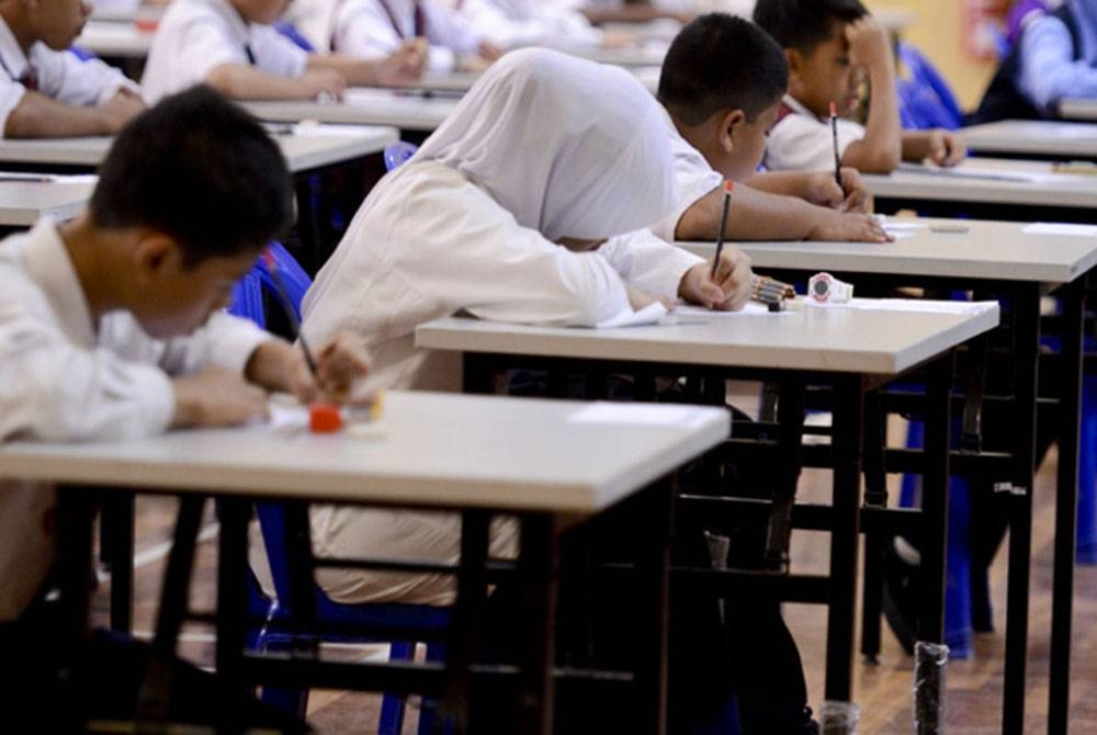 Mengembalikan peperiksaan UPSR dan PT3 bermula tahun ini merupakan salah satu cabaran kepada Kerajaan Perpaduan. - Gambar hiasan