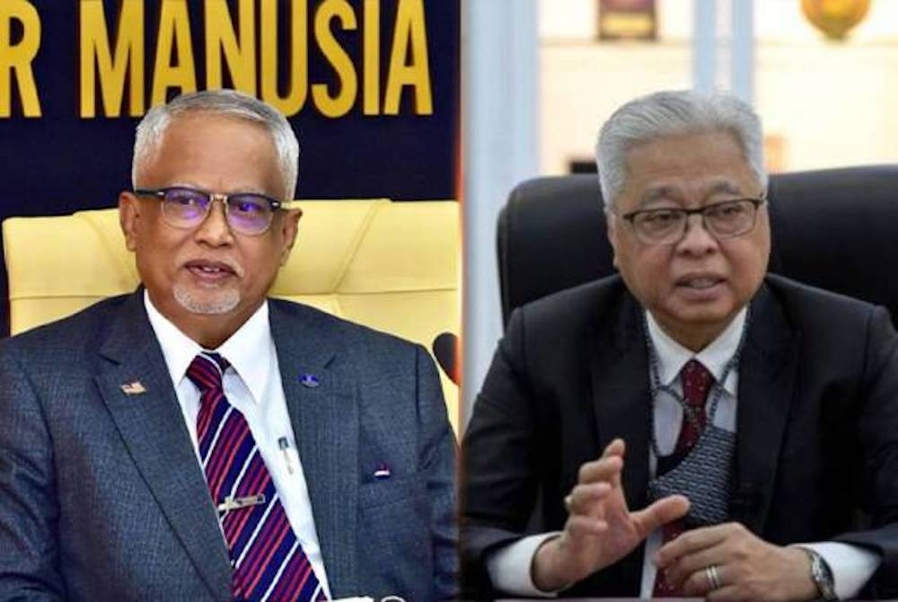 Mahfuz (kiri) membidas kenyataan Ismail Sabri yang menganggap kerjasama antara BN dan PH sebagai perkahwinan paksa.