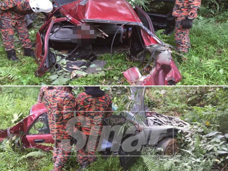 Anggota bomba memberi bantuan kepada mangsa kemalangan.