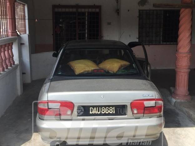 Kereta diparkir berhampiran rumah mangsa di Sungai Durian, hilang hari ini.