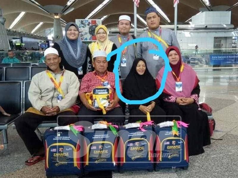 Allahyarham Khatijah Salleh, 63, bersama tujuh lagi ahli keluarganya bergambar sebelum berangkat ke tanah suci