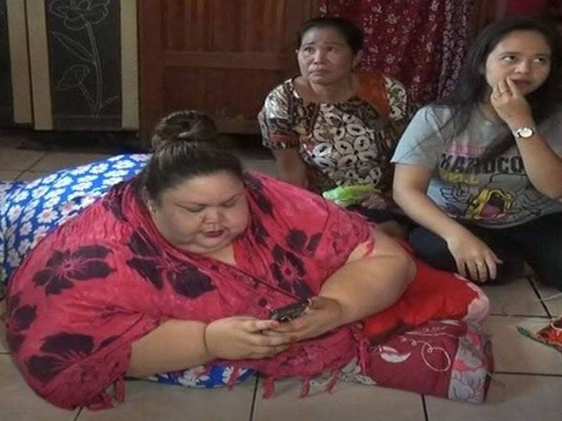 Titi Wati, seorang suri rumah dari Palangka Raya mempunyai berat badan mencecah 350 kg. - Foto iNews id