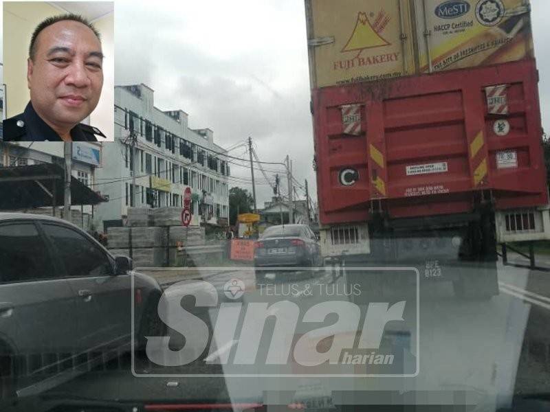 Trafik perlahan sekitar Guchil berikutan kerja naik aras Jambatan Kenor. Gambar kecil, Wan Fauzi.
