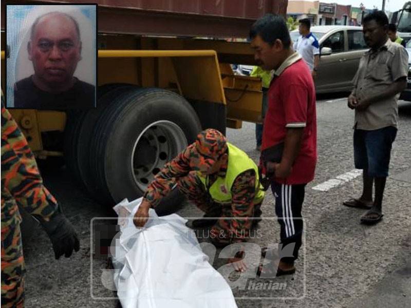 Anggota Balai Bomba dan Penyelamat Bagan Serai bertindak melitupi mayat mangsa dengan kain putih susulan terbabit kemalangan dengan sebuah treler tengah hari tadi. Gambar kecil: Masri 