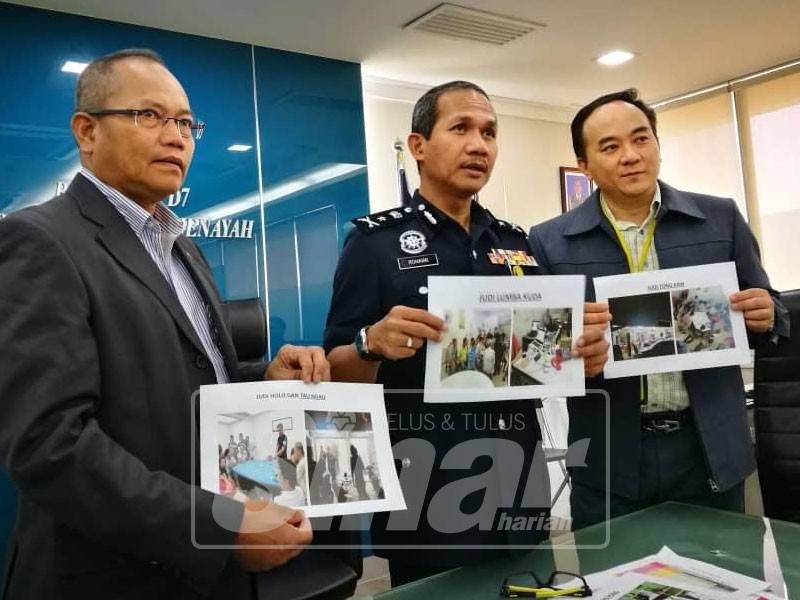 Rohaimi (tengah) menunjukkan jenis perjudian yang dirampas ketika Op Limau pada sidang akhbar di Bukit Aman, di sini, hari ini.