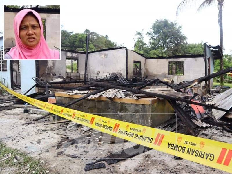 Keluarga malang ini terpaksa menumpang apabila kediaman mereka musnah. Gmabr kecil: Roslina