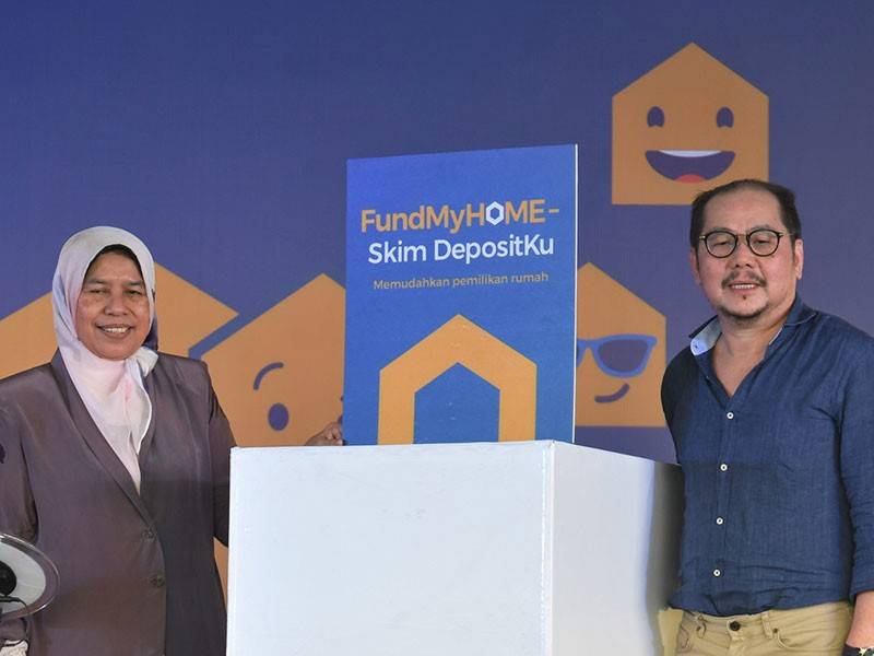 Menteri Perumahan dan Kerajaan Tempatan Zuraida Kamaruddin (kiri) merasmikan FundMyHome-Skim Depositku hari ini. - Foto Bernama