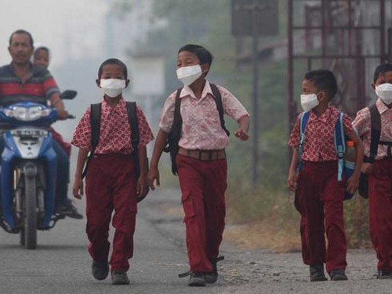 Pentadbiran wilayah Riau terpaksa menutup sekolah kerana jerebu makin teruk. - Foto: Antara 