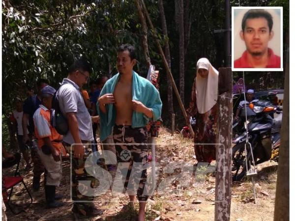 Mangsa (tengah) ditemui orang kampung ketika sedang mandi sungai di Kampung Air Musang, Gerik pada jam 2.30 petang hari ini.