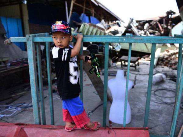 Enam bulan selepas gempa bumi dan tsunami yang melanda Palu,ribuan kanak-kanak masih lagi tinggal di penempatan sementara. - Foto Unicef