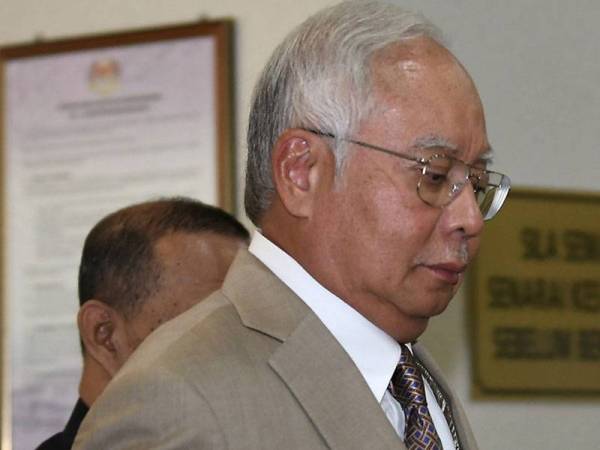 Bekas Perdana Menteri Datuk Seri Najib Tun Razak hadir pada perbicaraan kes yang dihadapinya membabitkan dana SRC International Sdn Bhd (SRC International) berjumlah RM42 juta di Mahkamah Tinggi Kuala Lumpur hari ini. - Foto Bernama