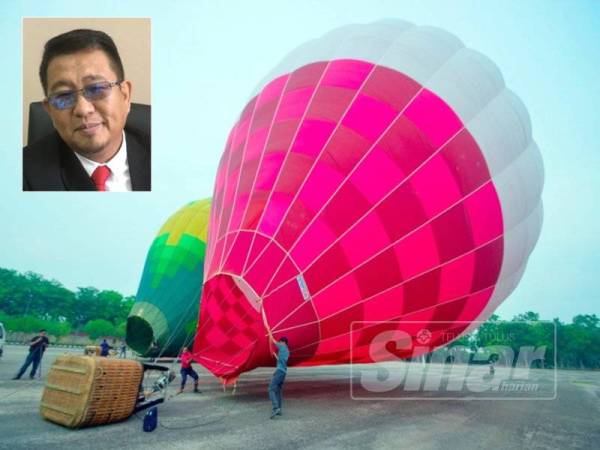 Penerbangan percubaan (test flight) belon udara panas yang diadakan dari Stadium Hang Jebat ke arah Klebang, Sabtu lalu. (Gambar kecil: Muhamad Jailani )