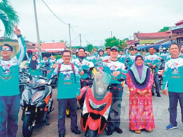 Ahsmon (empat dari kanan) ketika menyertai program Kembara Kapcai 2019 Budimu Dikenang Sempena Peringatan Hari Polis Ke 212, baru-baru ini.