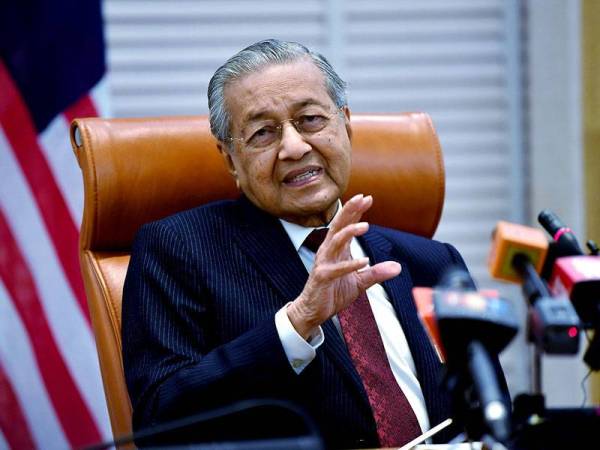 Perdana Menteri Tun Dr Mahathir Mohamad semasa sidang media khas sempena setahun pemerintahan kerajaan Pakatan Harapan di Bangunan Perdana Putra baru-baru ini. - Foto Bernama