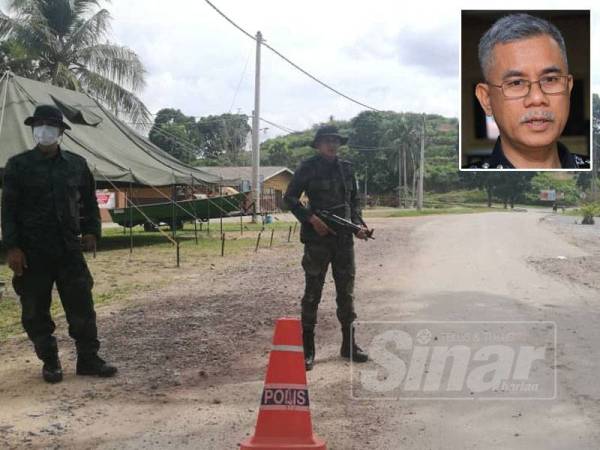 Anggota keselamatan mengawal laluan masuk ke Kuala Koh di Aring 10 di Gua Musang. - Gambar kecil: Hasanuddin Hassan