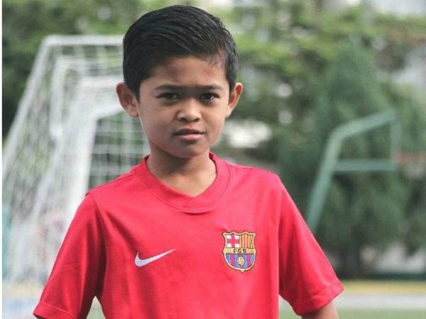 Muhammad Hazriq ketika menyertai latihan bersama Akademi Barcelona di Singapura.