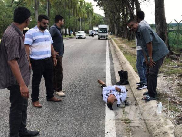 Hasnol yang cedera dilanggar mendapat bantuan orang awam yang berada di lokasi kejadian pagi tadi.