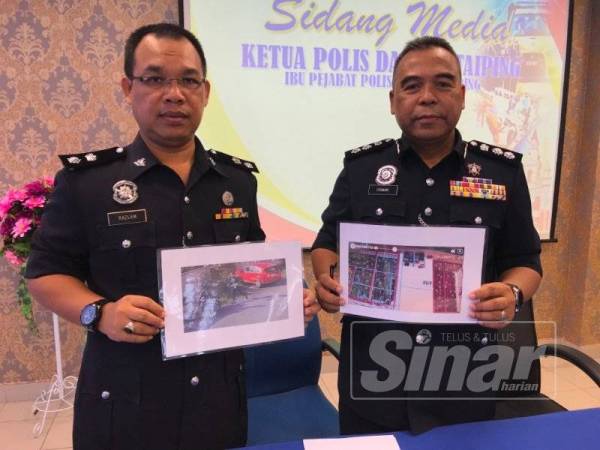 Osman (kanan) bersama timbalannya, Superintendan Razlam Ab Hamid menunjukkan keratan gambar yang diambil menerusi rakaman kamera litar tertutup (CCTV) yang berjaya merakam perbuatan jenayah kedua-dua suspek.