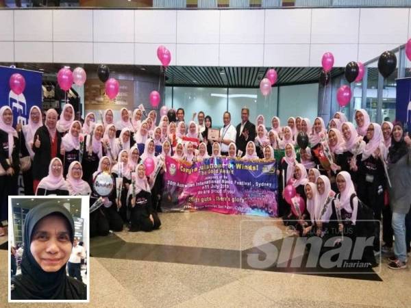 Anggota SP Winds disambut di KLIA sebaik pulang menyertai 30th Australian International Music Festival (AIMF), di Sydney, malam tadi. (Gambar kecil: Roslina)