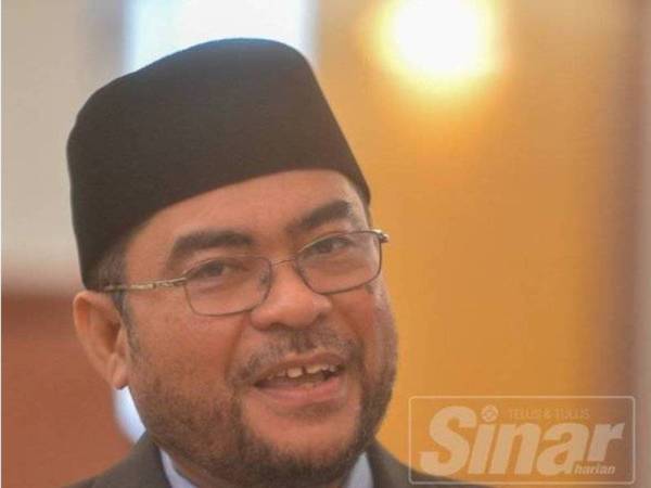 Dr Mujahid
