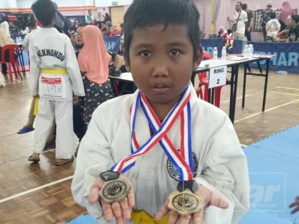 Haziq dinobatkan peserta terbaik selepas menang dua pingat iaitu emas bagi kategori 'sparring' dan perak bagi kategori 'patterns'.