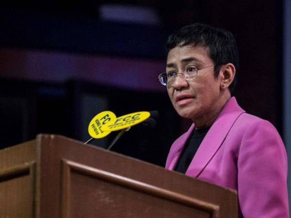 Maria Ressa berdepan hukuman penjara sekiranya disabitkan bersalah dalam perbicaraan kes fitnah. - Foto AFP