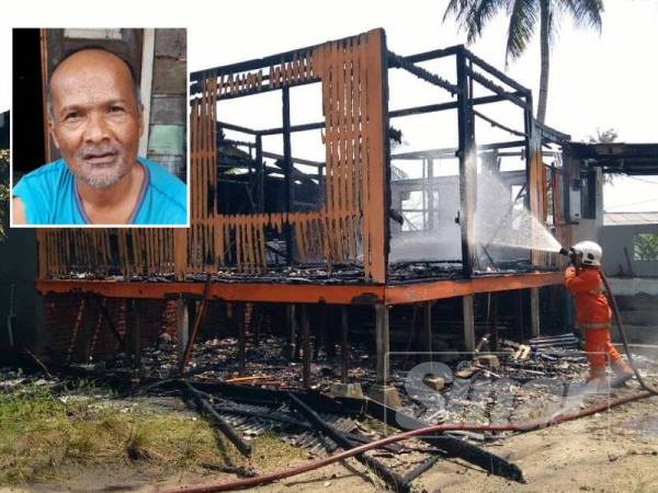 Anggota bomba memadamkan sisa kebakaran rumah yang dihuni 13 penyewa di Kampung Limbong, Bandar Paka, Dungun hari ini. (Gambar kecil, Mat Daud)