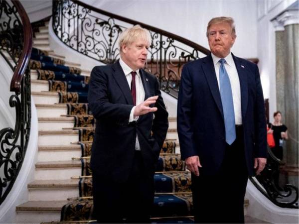 Presiden AS, Donald Trump (kanan) bersama Perdana Menteri Britain, Boris Johnson. - FOTO AFP