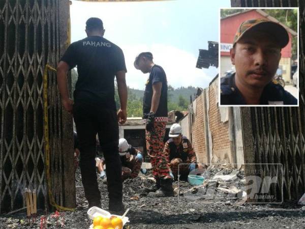 Pihak Bomba sedang menjalankan excavation (penggalian). (Gambar kecil, Mohd Saharul Nizam)