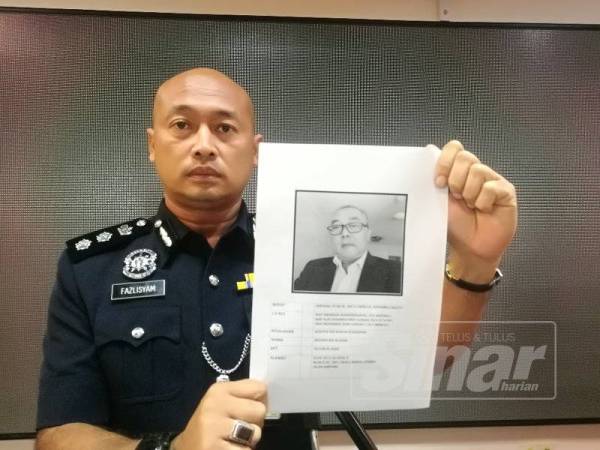 Fazlisyam menunjukkan individu yang dicari polis bagi membantu siasatan kes penipuan projek perumahan mampu milik.