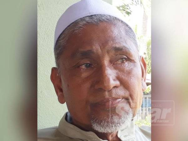 Mohd Kassim sebak apabila bercerita dan mengenang tentang anaknya, Allahyarham Muhammad Adib. (Gambar arkib SInar Harian)