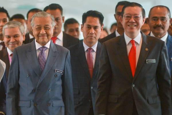 Dr Mahathir, Guan Eng