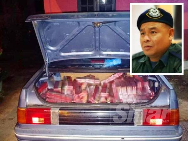 PGA Batalion 7 Kuantan menemui 610 karton rokok di dalam sebuah kereta jenis Proton Iswara pagi tadi. (Gambar kecil: Azhari)