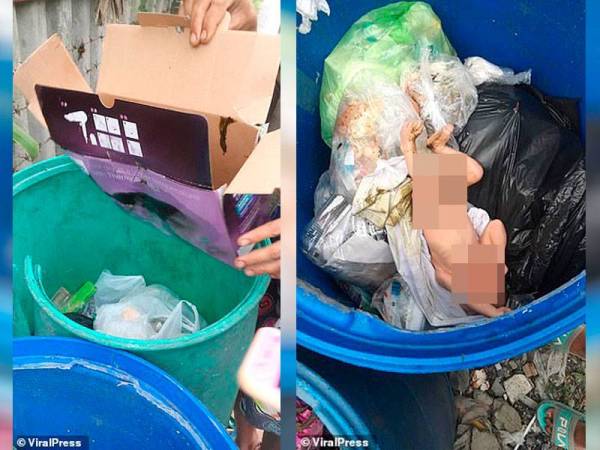 Bayi perempuan dipercayai berusia seminggu ditemui dalam tong sampah di Bangkok,Thailand. - Foto: Viral Press