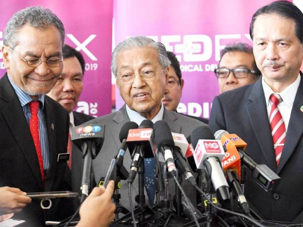 Perdana Menteri Tun Dr Mahathir Mohamad (tengah) Foto: BERNAMA