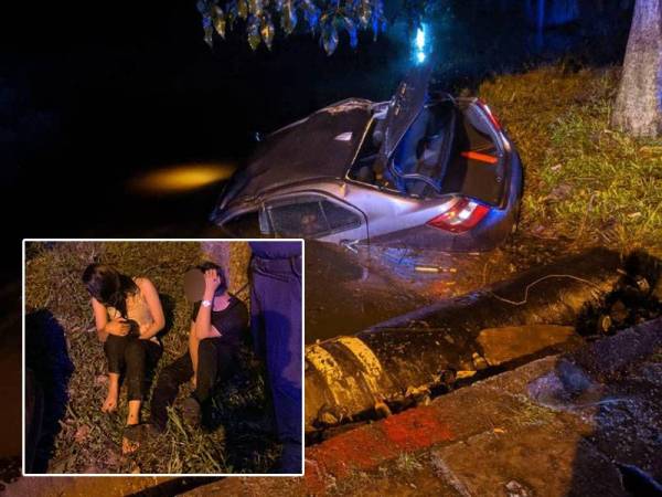 Kereta dipandu suspek terhumban ke dalam longkang selepas terbabas ketika melarikan diri daripada diperiksa polis. Gambar kecil: Suspek dan teman wanitanya berjaya diselamatkan selepas kereta mereka terhumban ke dalam longkang.