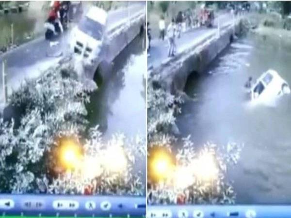 Sebuah kereta yang membawa lima penumpang terjatuh ke dalam sungai di Madhya Pradesh, India ketika cuba mengelak bertembung dengan sebuah kenderaan roda tiga di atas sebuah jambatan sempit. - Foto ANI