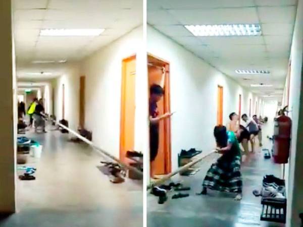 Tangkap layar video yang memaparkan mahasiswa UTP bermain tarik tali di koridor kolej kediaman mereka.