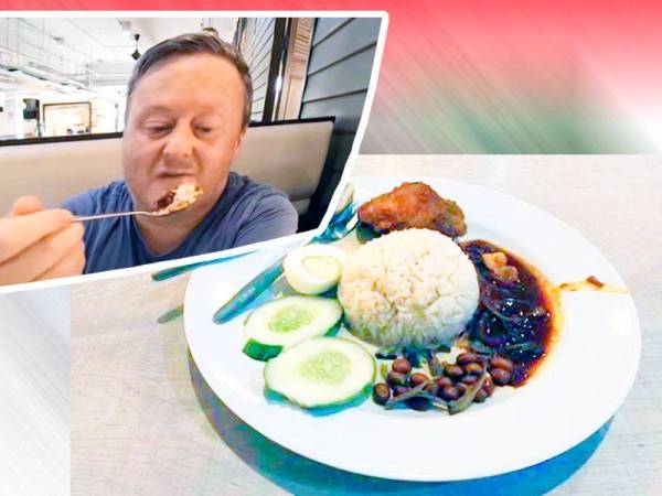 Darren menikmati nasi lemak sejurus tiba di Kuala Lumpur.