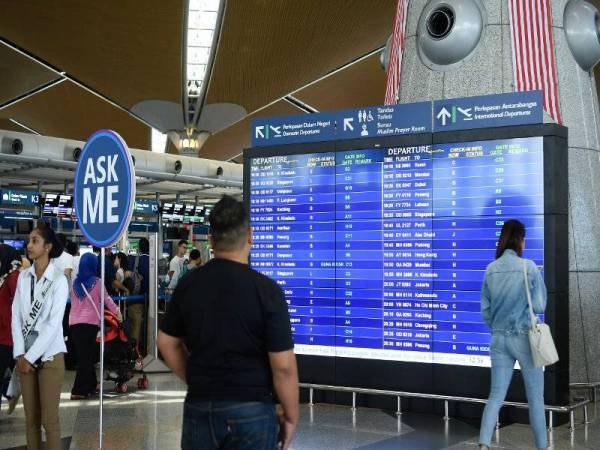 Gangguan sistem operasi di Lapangan Terbang Antarabangsa Kuala Lumpur (KLIA), Ogos lepas. - Foto Bernama