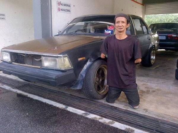 Pak Busu seorang mekanik di bengkel IM Auto Garage.