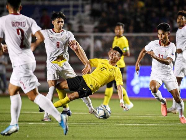 Pemain Harimau Muda perlu bangkit melakar kemenangan dalam dua aksi terakhir untuk mencerahkan peluang ke peringkat separuh akhir. -Foto Bernama