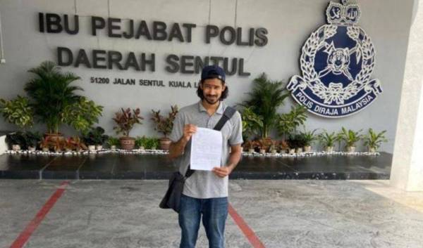 Muhammad Yusoff telah membuat laporan polis dan menyerahkan akuan bersumpah kepada Ibu Pejabat Polis Daerah Sentul tadi. FOTO: MALAYSIAKINI