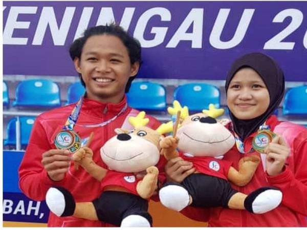 Mohammad Nor Musyaraf Mohd Sari dan Nur Aishah Rofina Aling dapat gelaran Raja dan Ratu Pecut temasya Sukan Sabah (SAGA) XI 2019.